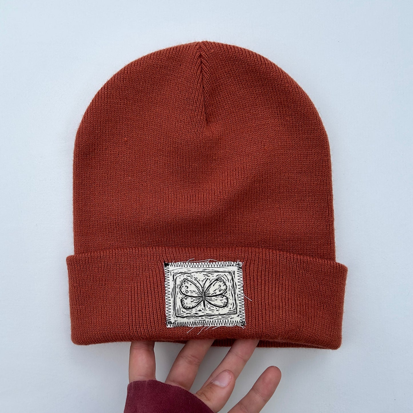 moth orange beanie