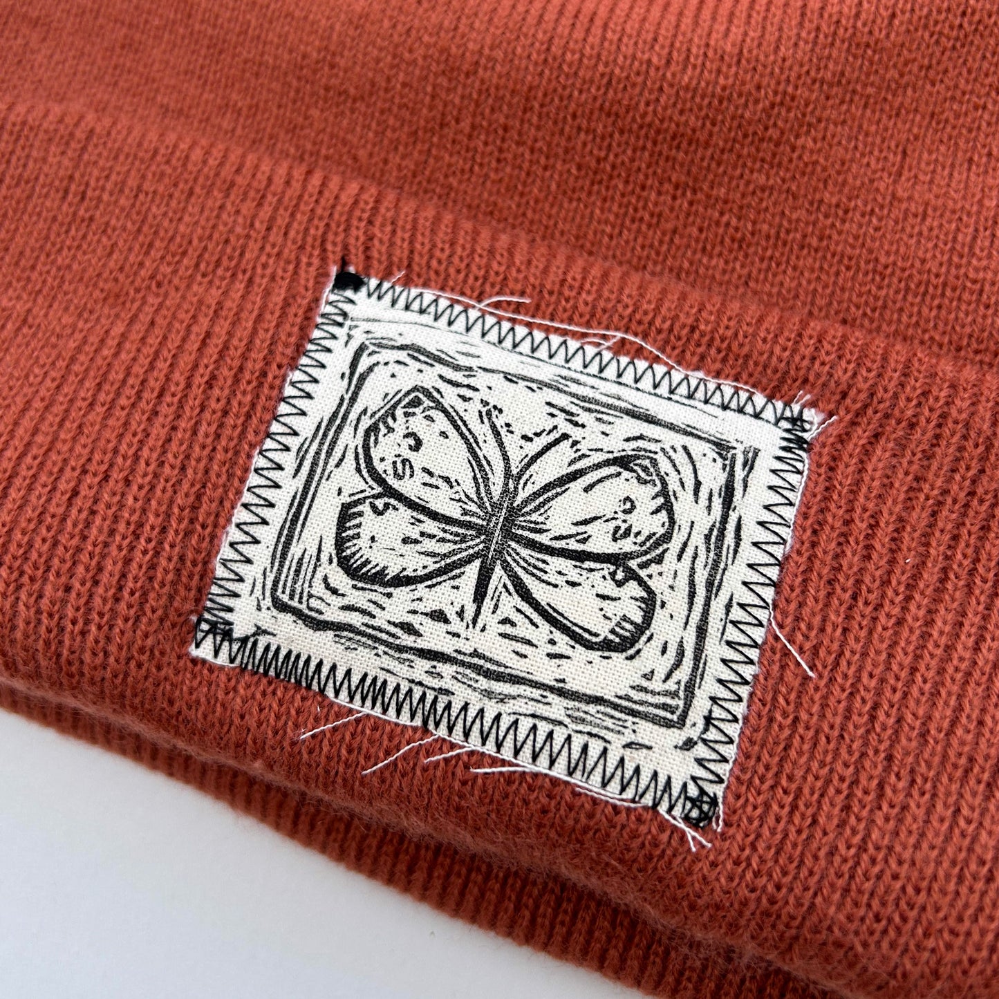 moth orange beanie