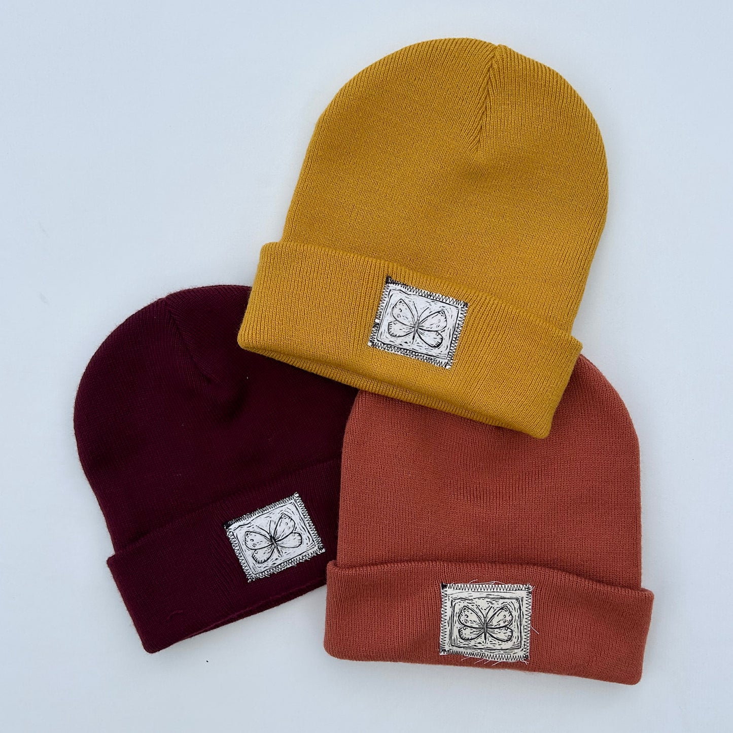 moth maroon beanie
